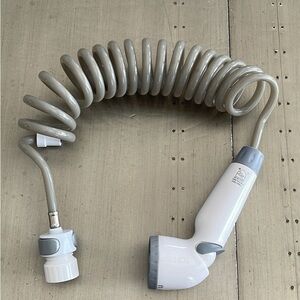 Gray and White Handheld Shower Head for dogs